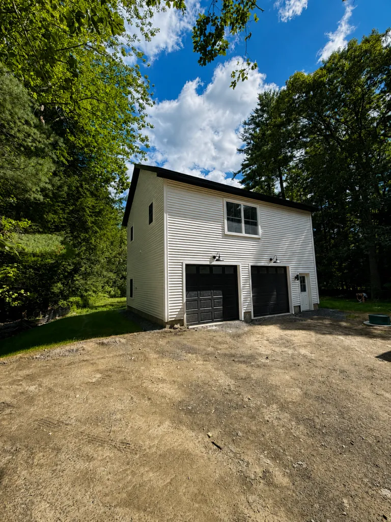 ADU with living space above a detached two-car garage in Maine