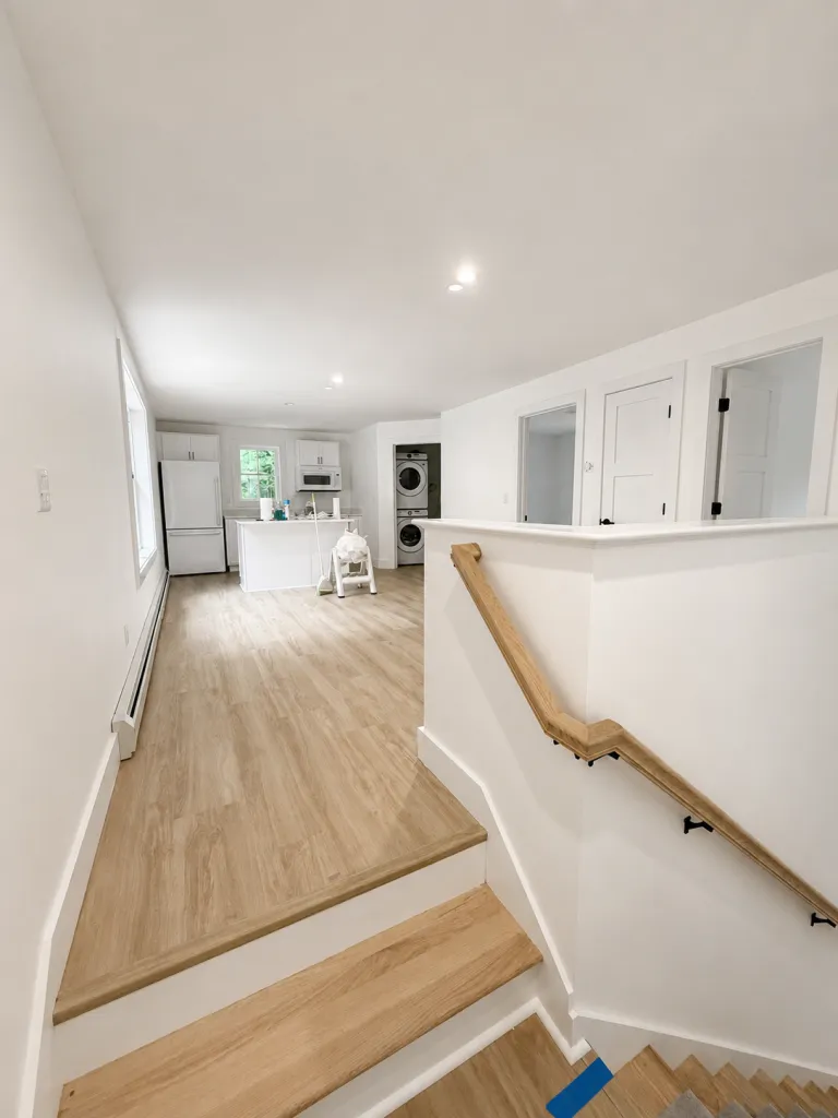 Finished apartment above a garage with open kitchen and living area in Maine