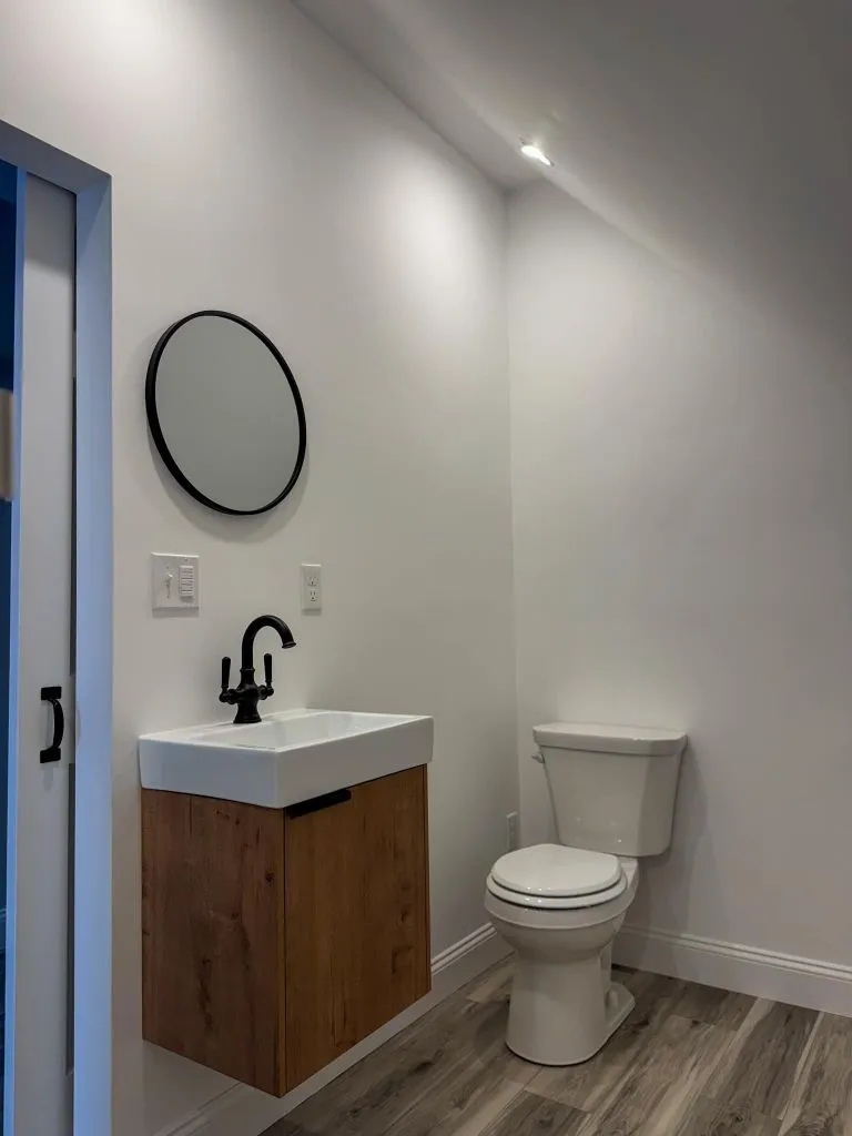 Half bath renovation with floating vanity in Maine