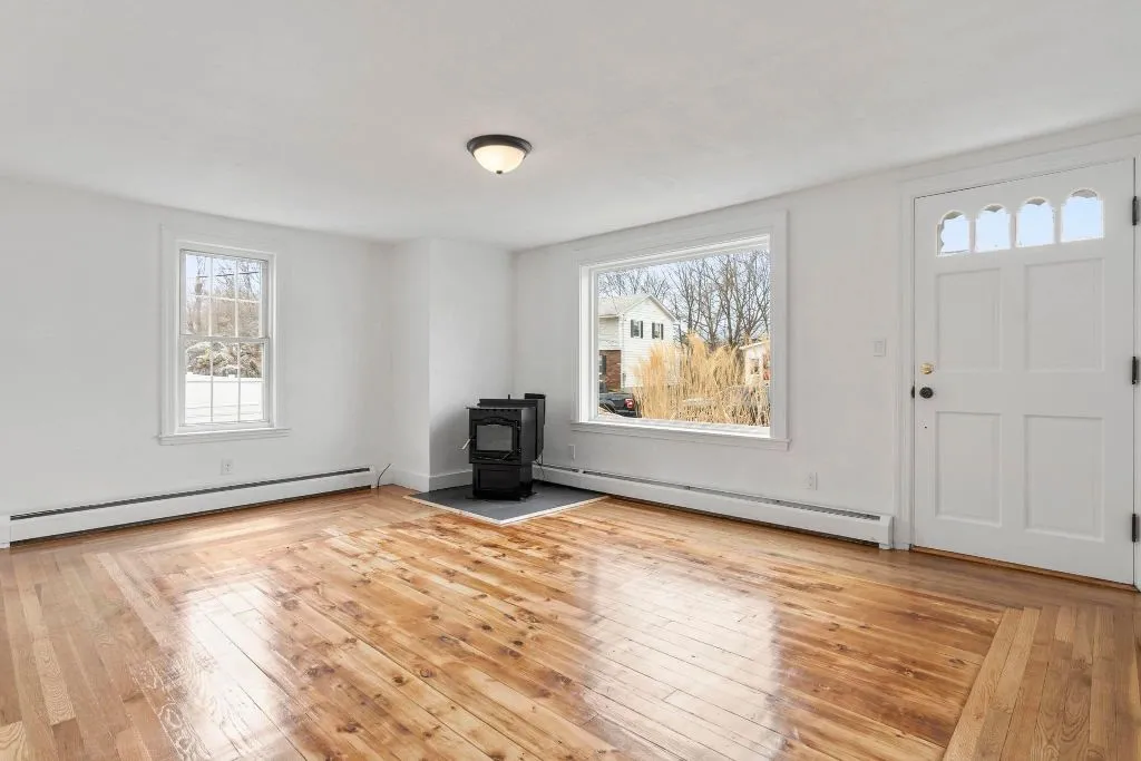 Living room property rehab in Maine