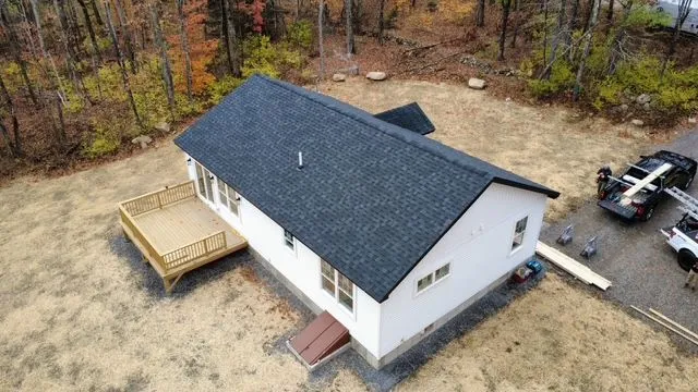 Aerial drone view of new roof installation in Maine