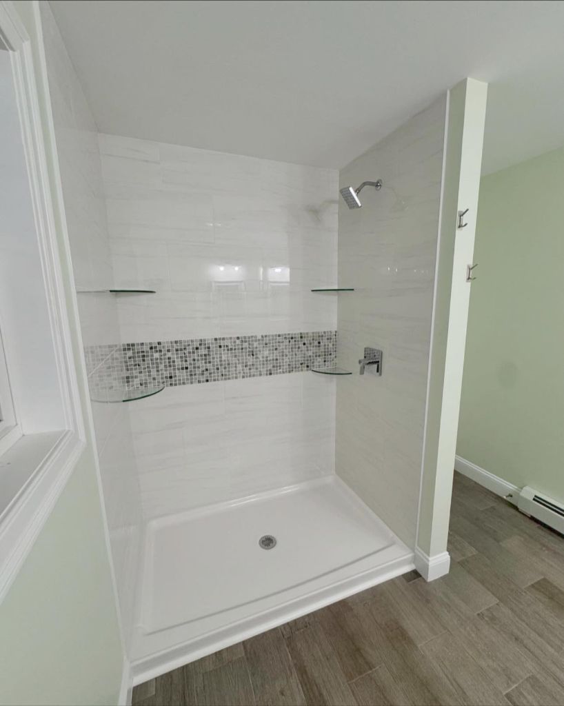 Walk-in shower installation with mosaic tile in Maine