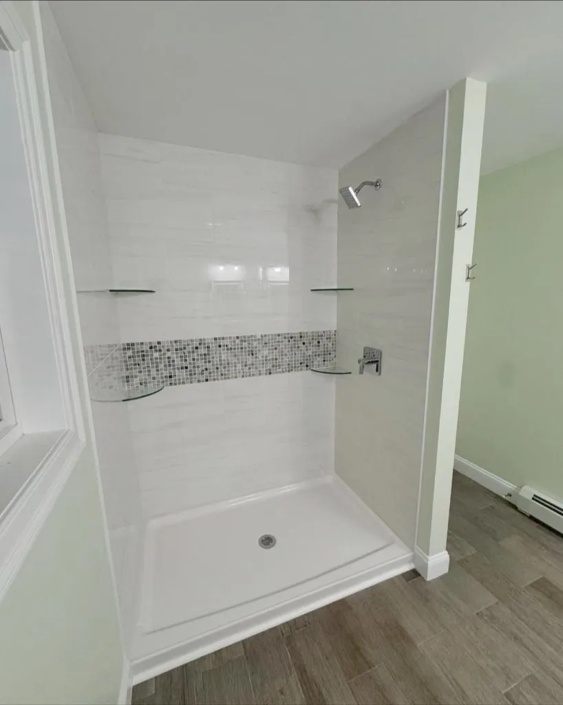 Walk-in shower installation with mosaic tile in Maine